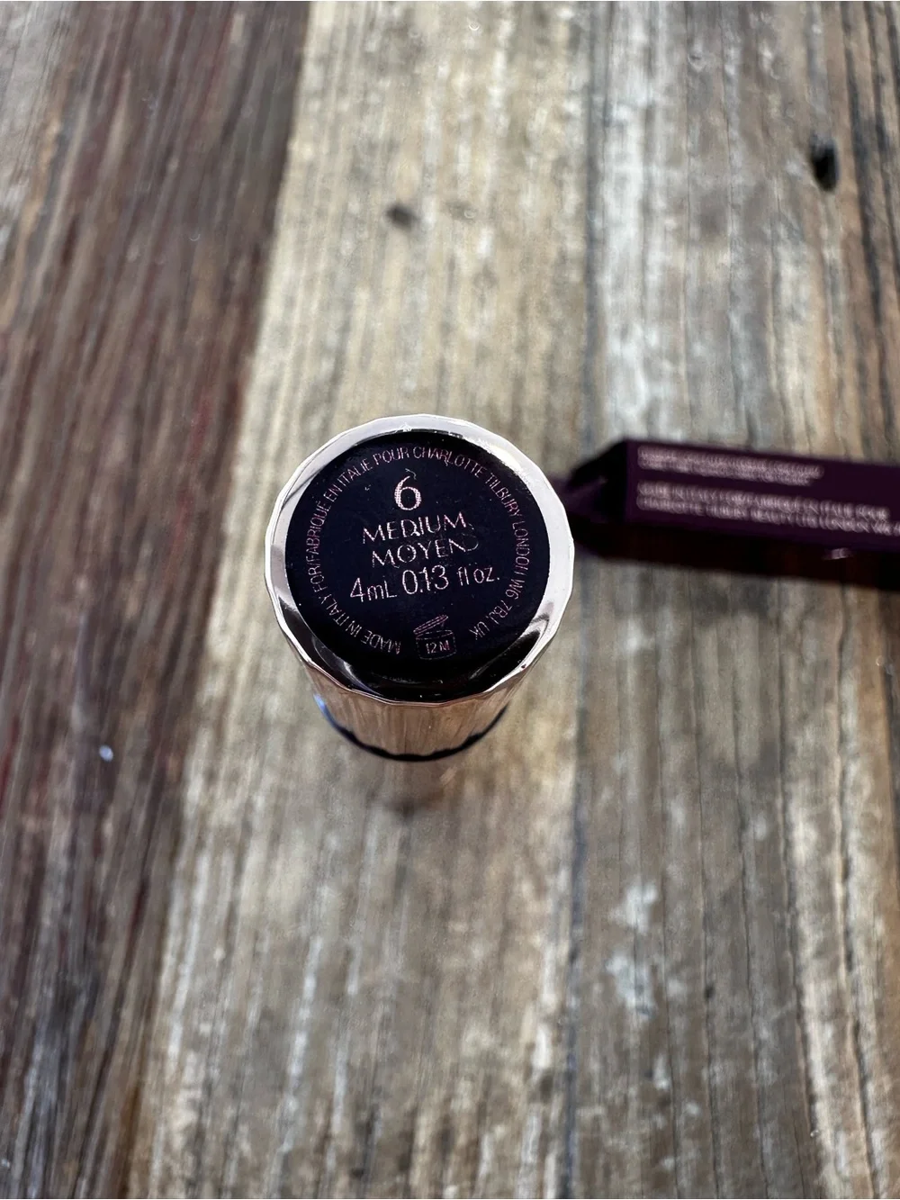 Charlotte Tilbury Liquid Concealer in Deep Burgundy Packaging